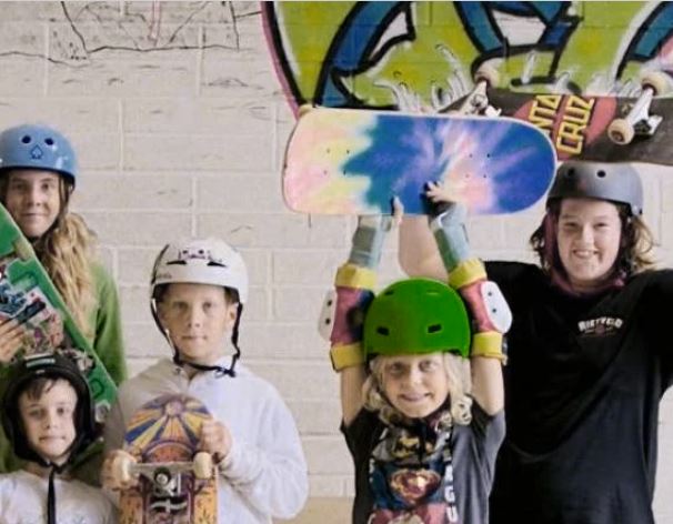 Image of children with skateboards,