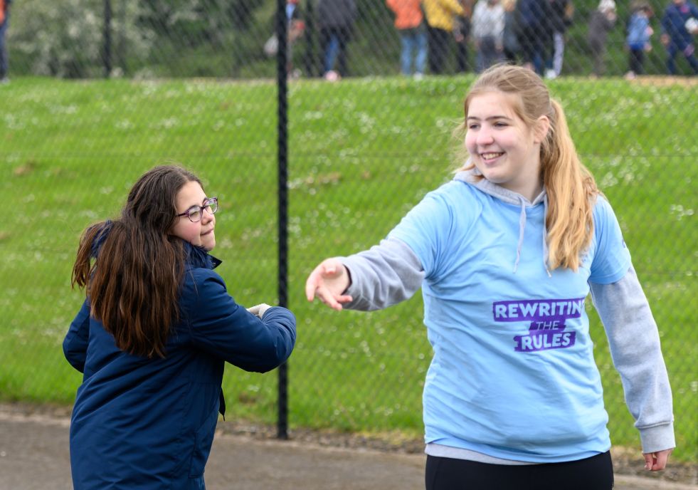 A young woman coaching sport